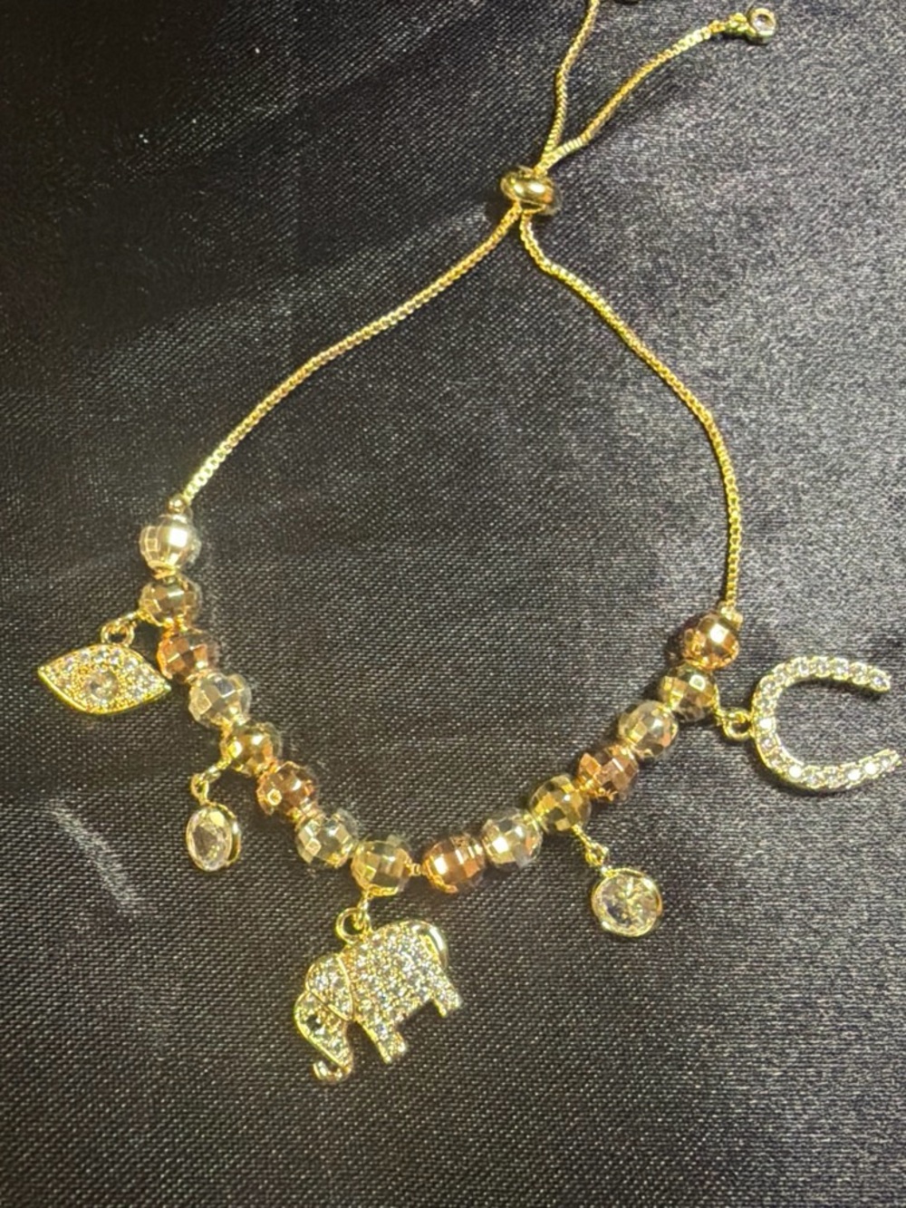 Gold Tone Elephant Charm Slider Bracelet with Crystal Accents